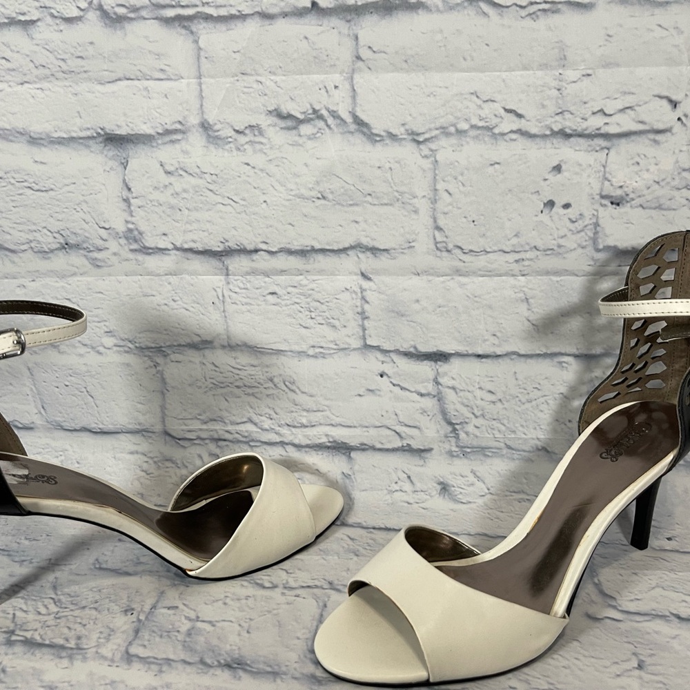 Carlos Santana white and black heels. Never worn. Size 10